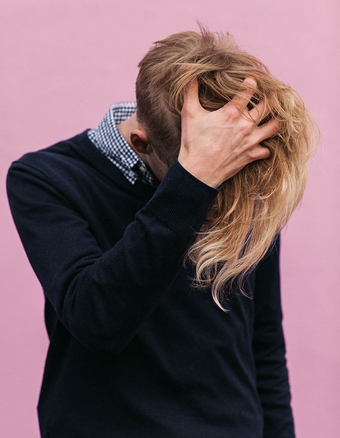 Man Scratching Scalp