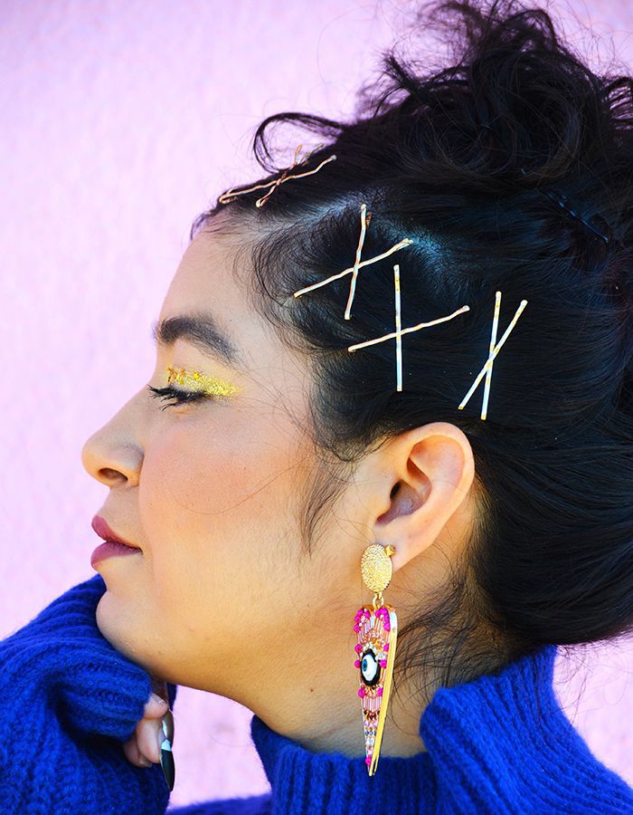 Woman wearing bobby pins in her hair