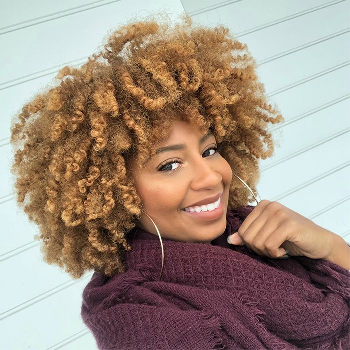 African-American women with copper curly hair