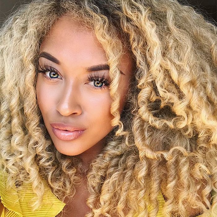 Woman with curly blonde hair