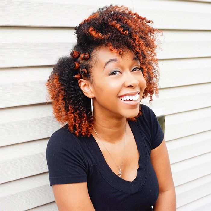 African-American woman with curly ombre hair