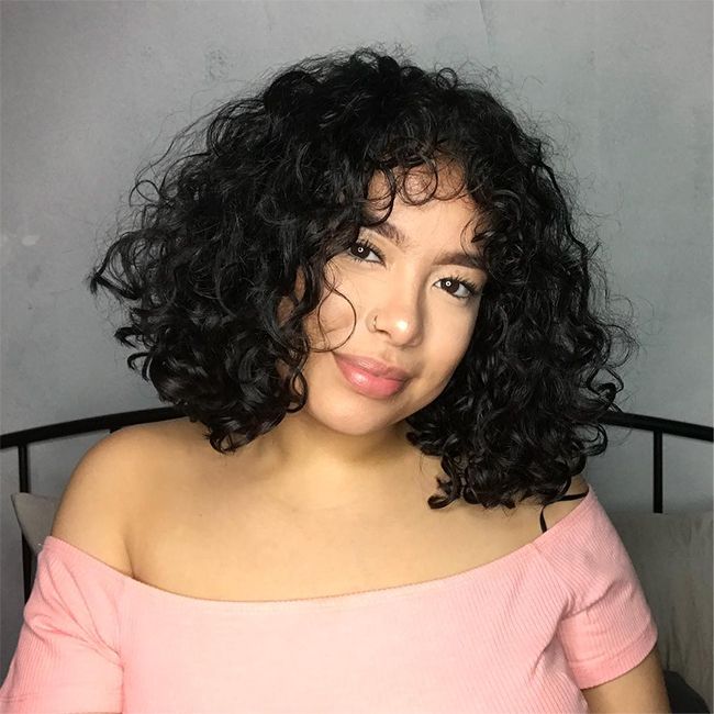 25 Photos That Will Make You Want Curly Bangs