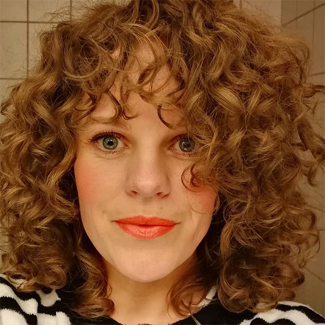 25 Photos That Will Make You Want Curly Bangs ...