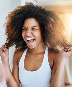 Does Co-Washing Cause Hair Loss? A Trichologist Weighs In