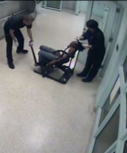 Policewoman Cuts Detained Woman's Hair