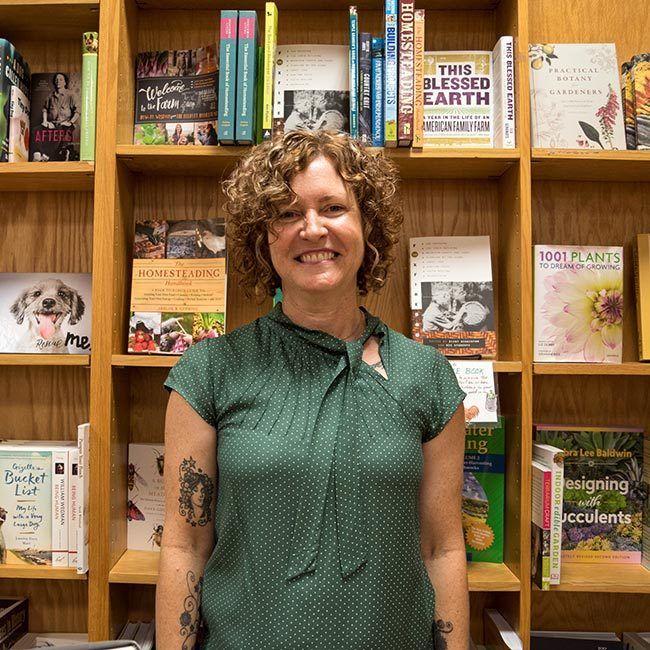 Local artist Suzzane Schroeder photographed b y Amy Weiss Photography inside BookPeople for The Curl Revolution book signing.