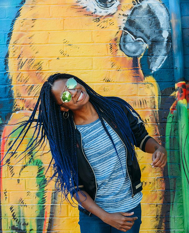 woman with long blue braids