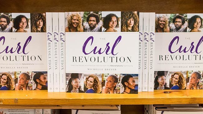 copies of the curl revolution by michelle breyer Copies of The Curl Revolution by Michelle Breyer sit on retail shelves at BookPeople in Austin, TX.