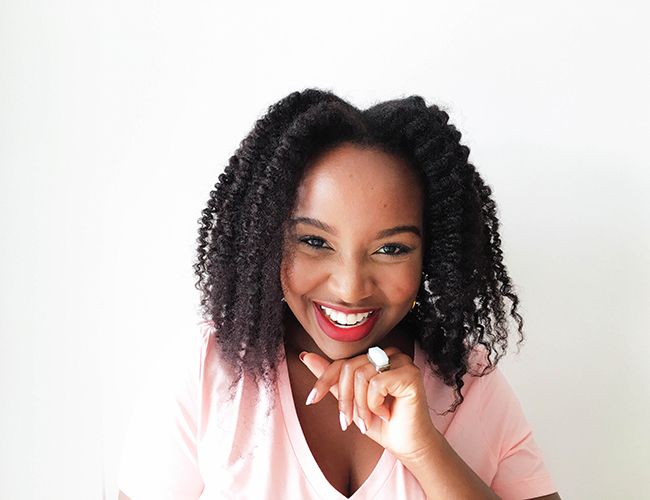 African-American woman smiling with natura hair