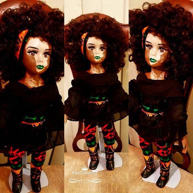 Vitiligo doll with Africa on face