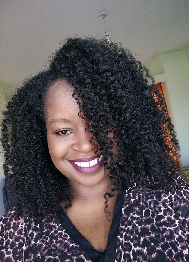 natural hair kenya girl smiling with natural hair