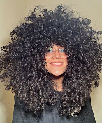 Here’s How to Care for Your Curly Hair and Grow it Fast Naturally
