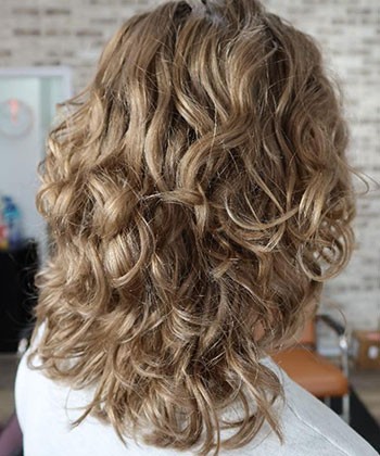 What to Do When the Bottom Layer of Your Hair Is Much Less Curly Than the Top Layer