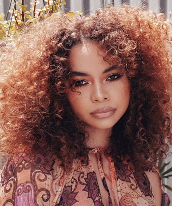 18 Curly Copper Hair Goals That'll Jump Start Your New Summer Look