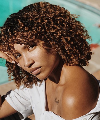 Texture Tales: Kim Shares Her Natural Hair Journey and The Impact It Made on Loving Herself
