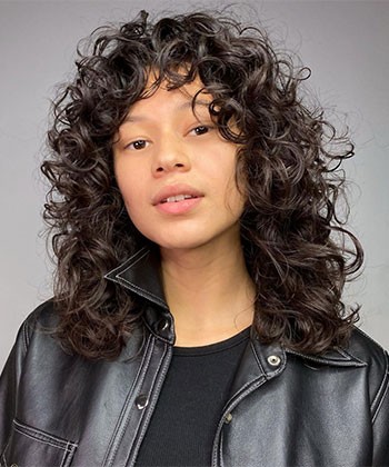 18 Ways to Rock Curtain Bangs on Curly Hair